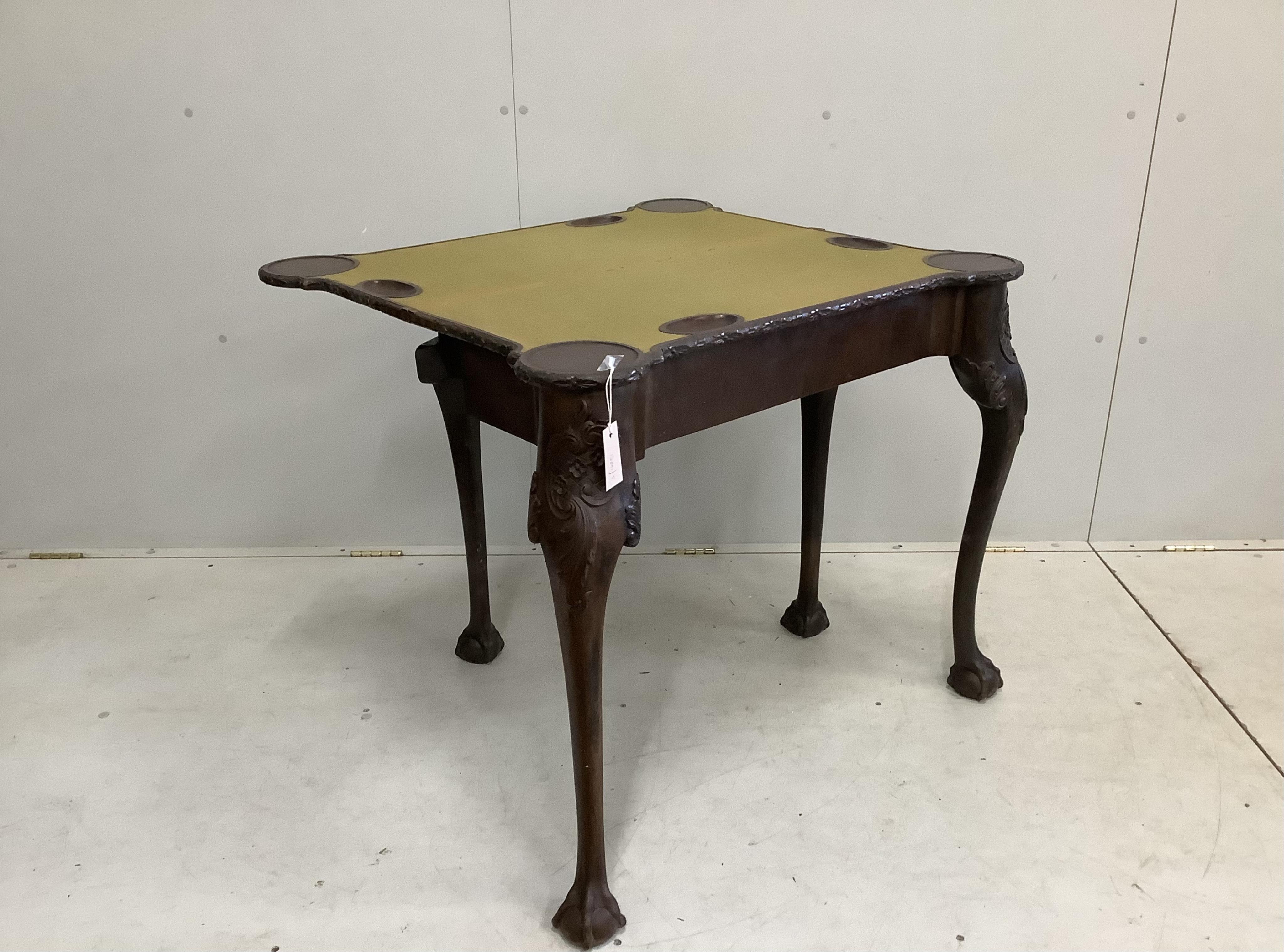 A George II style mahogany folding card table, width 88cm, depth 40cm, height 77cm.